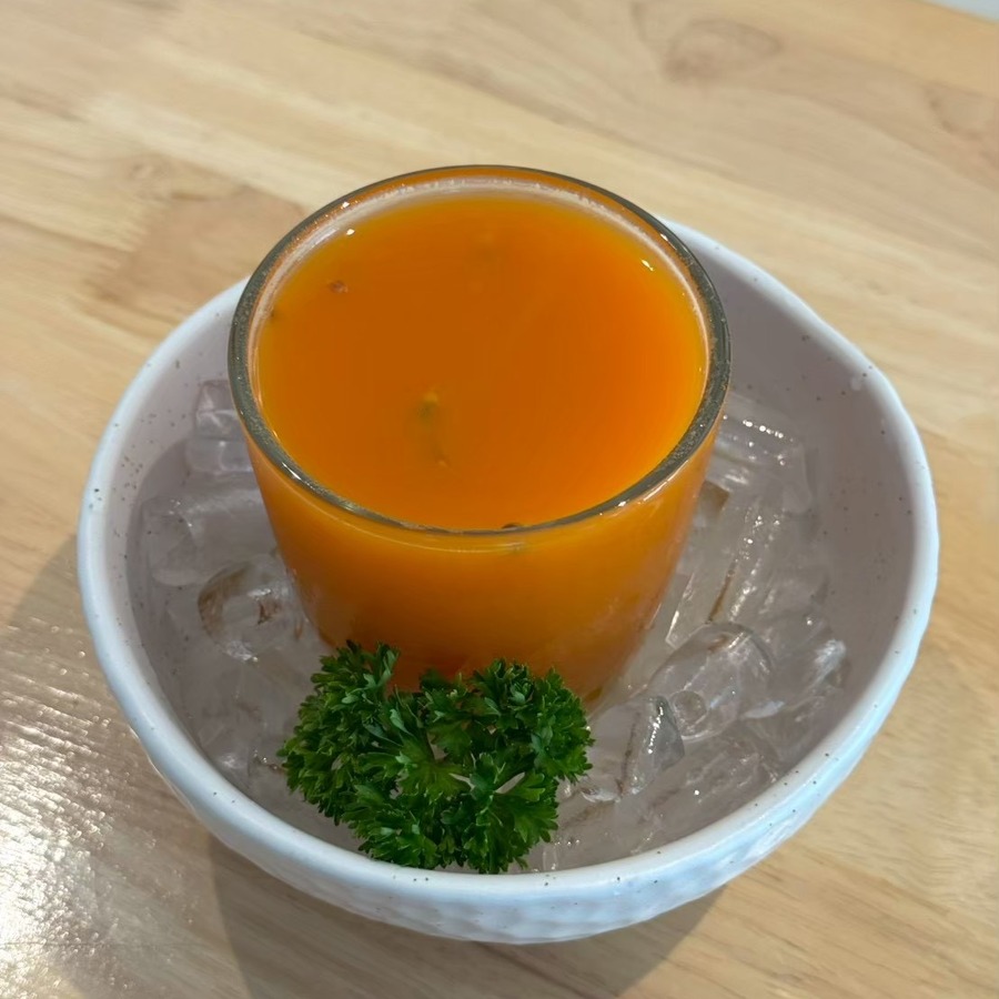 Real carrot, apple, and ginger juice at Sunflower Smoothies & Coffee in Chiang Mai